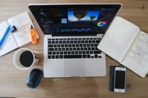 overhead shot of a laptop with photo editing software