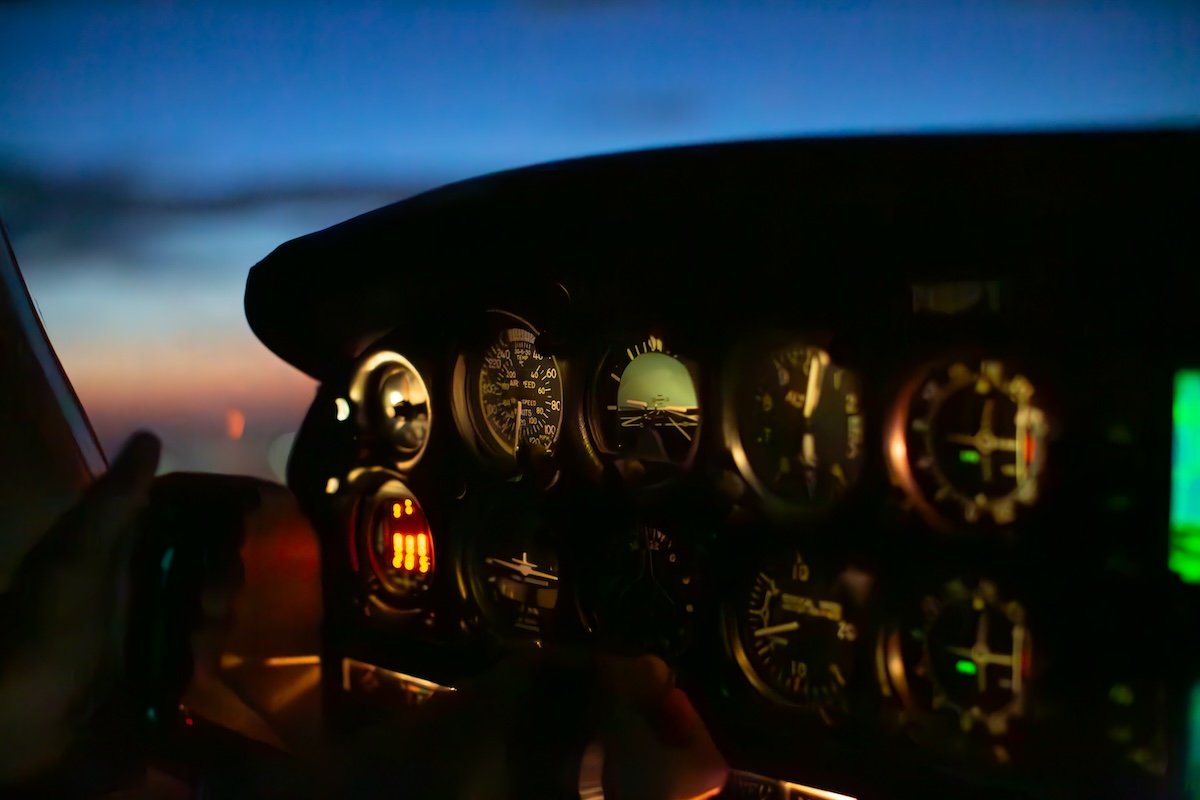 photograph of a cockpit of a plane at night with denoise applied 