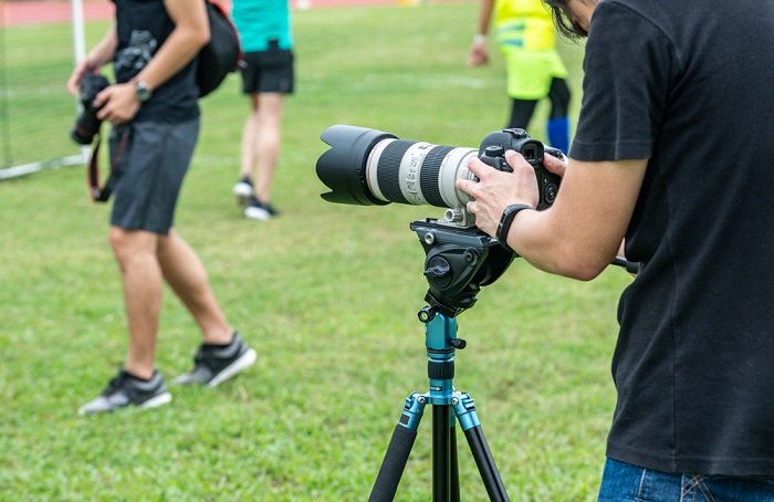 Camera on a tripod at a sporting event